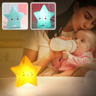 Veilleuse bebe étoile illuminant doucement la pièce.