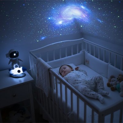 Bébé calme avec veilleuse projection 