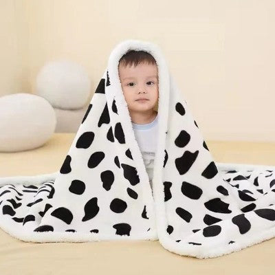 couverture bebe polaire blanche motif tache enveloppant enfant assis